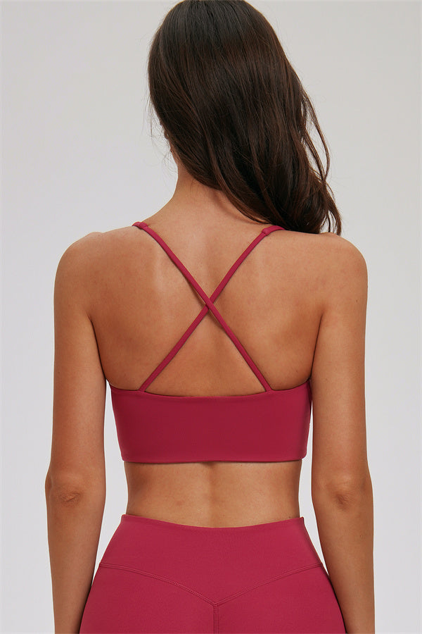Fitglutes activewear set featuring a kinetic zip jacket, cross-back sports bra, and matching leggings for workout and gym wear.