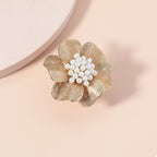 18K gold-plated pearl flower ring with delicate floral design, showcasing a lustrous pearl centerpiece and intricate metalwork.