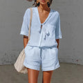Women's lace-up short-sleeve shirt and loose shorts set by Plush Fashion Hub, casual summer co-ord outfit, light and comfortable.