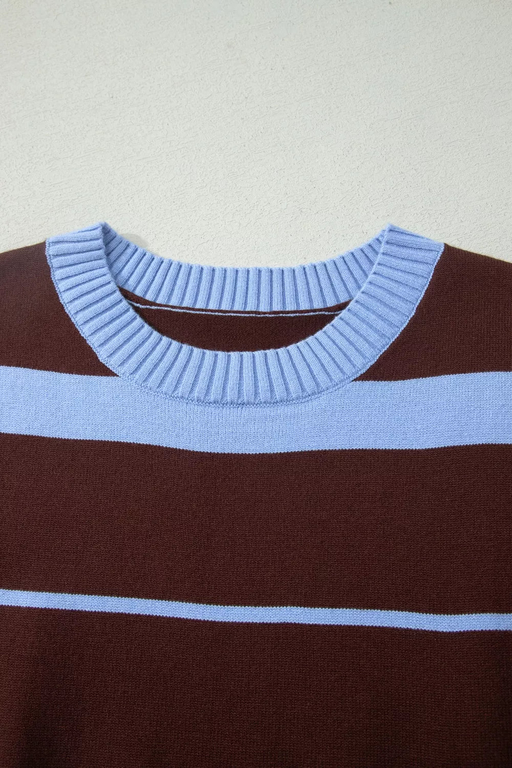 Striped short sleeve round neck casual knit top by Plush Fashion Hub, featuring colorful horizontal stripes and comfortable fit.