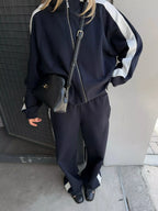 Trendsi zip-up long sleeve tracksuit set with matching pants, featuring a comfortable fit and casual style.
