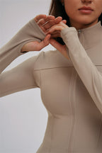 Fitglutes Activewear 3-piece set with Kinetic Zip Jacket, cross-back sports bra, and matching leggings for workout and gym activities.