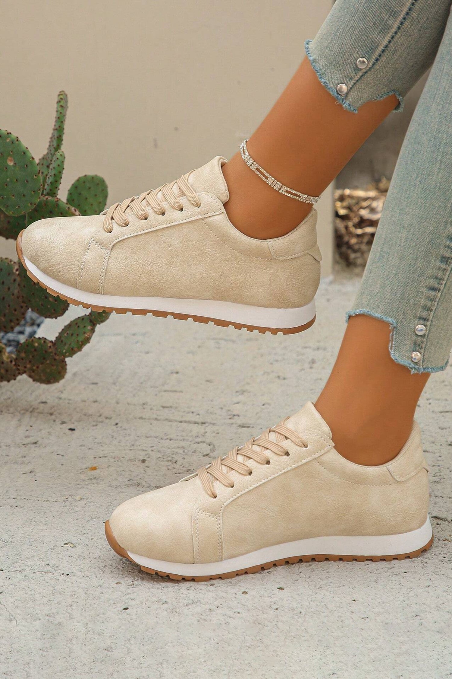 Womens Wren Suede Lace Up Sneakers by Threaded Pear, stylish beige suede shoes with white rubber soles and laced fronts.