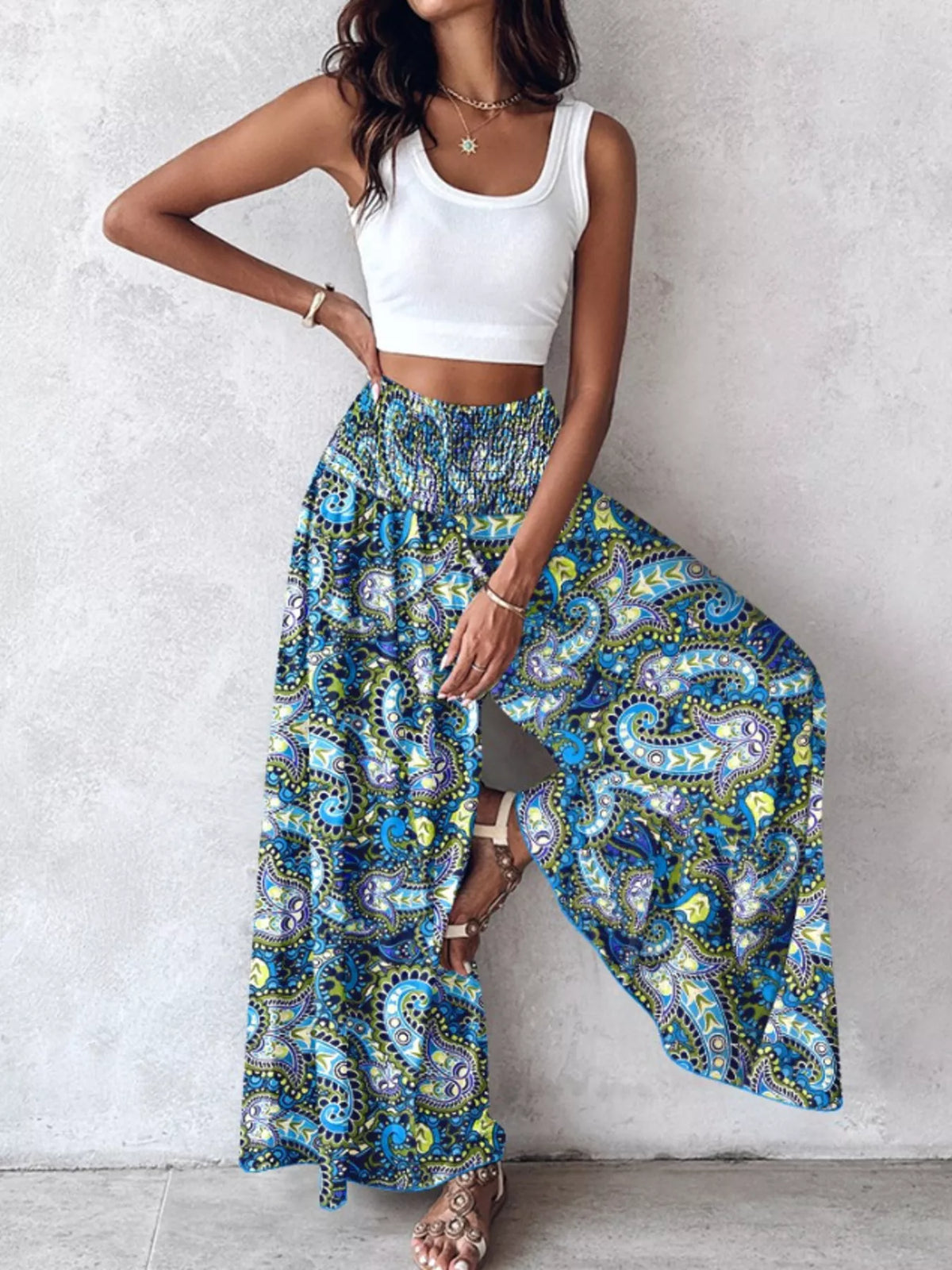 Printed wide-leg pants from Plush Fashion Hub featuring a vibrant, colorful pattern and a relaxed fit for casual style.