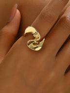 18K gold-plated stainless steel geometric ring with modern design, featuring sleek angular shapes and a polished finish.