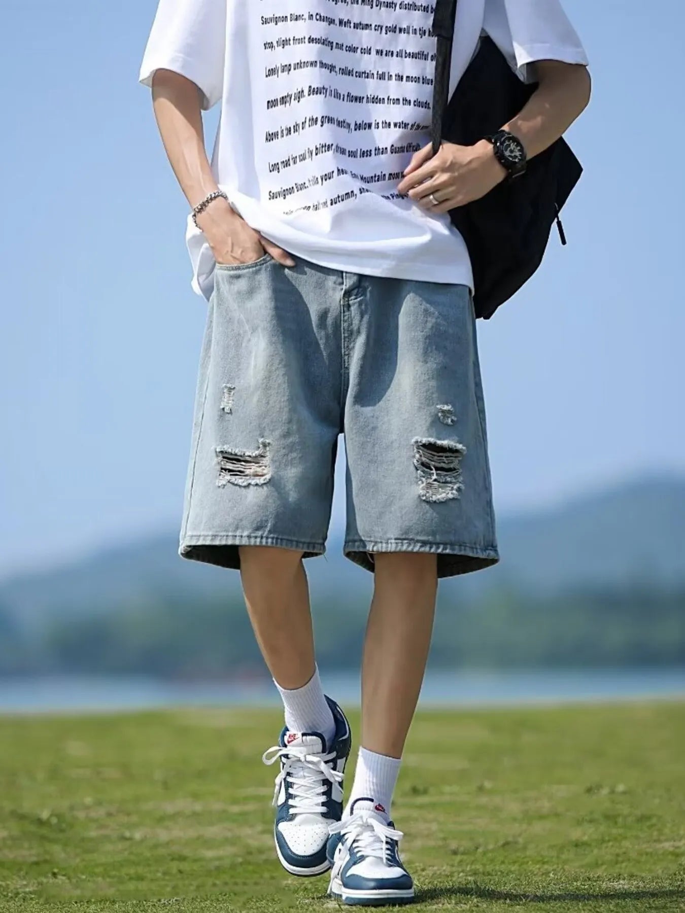 Men's casual loose fit ripped denim shorts by Plush Fashion Hub, plus size bottoms with distressed detailing and relaxed style.