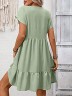 Women's casual V-neck mini dress with ruffle hem and ruched detailing, stylish dress by Trendsi, perfect for everyday wear.