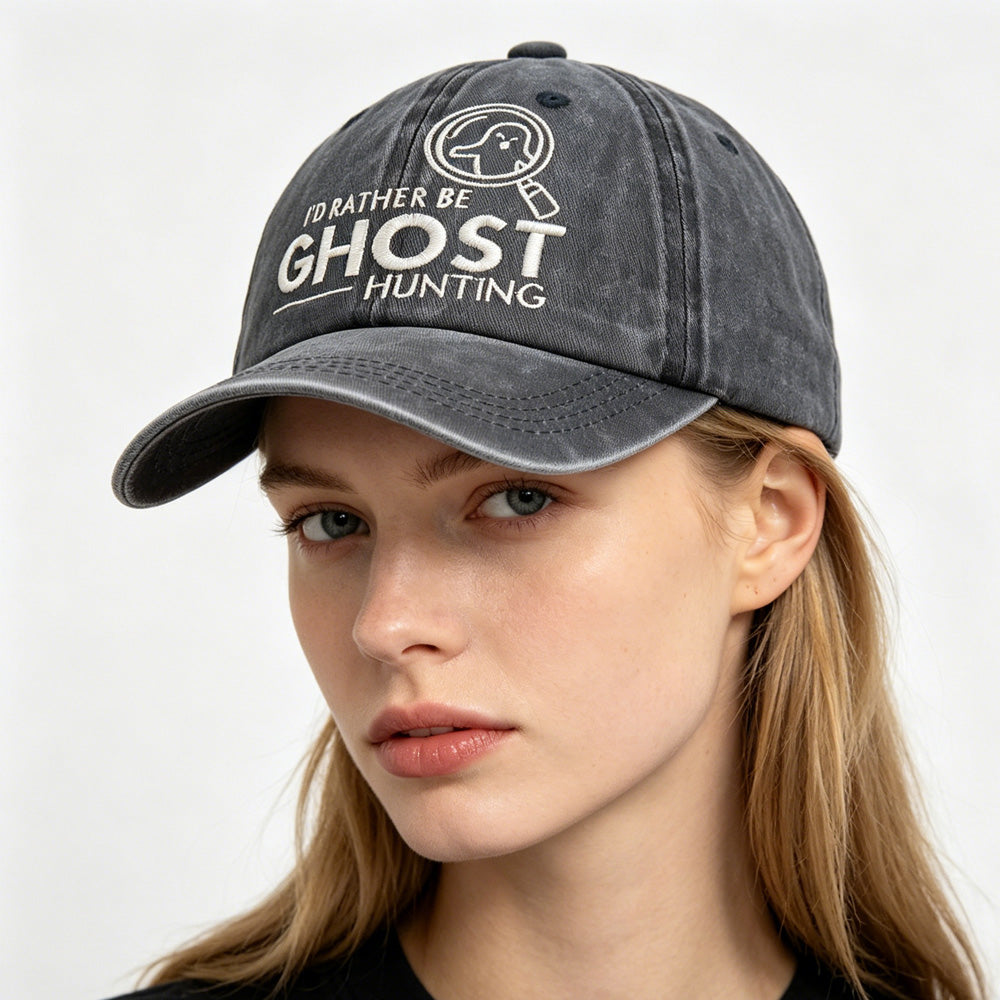 Washed baseball cap by FitiqueFit with embroidered "I'd Rather Be Ghost Hunting" design, retro paranormal hat style.