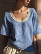 Plus size Shopimist short sleeve blouse with lace trim, featuring a full size fit and elegant design.
