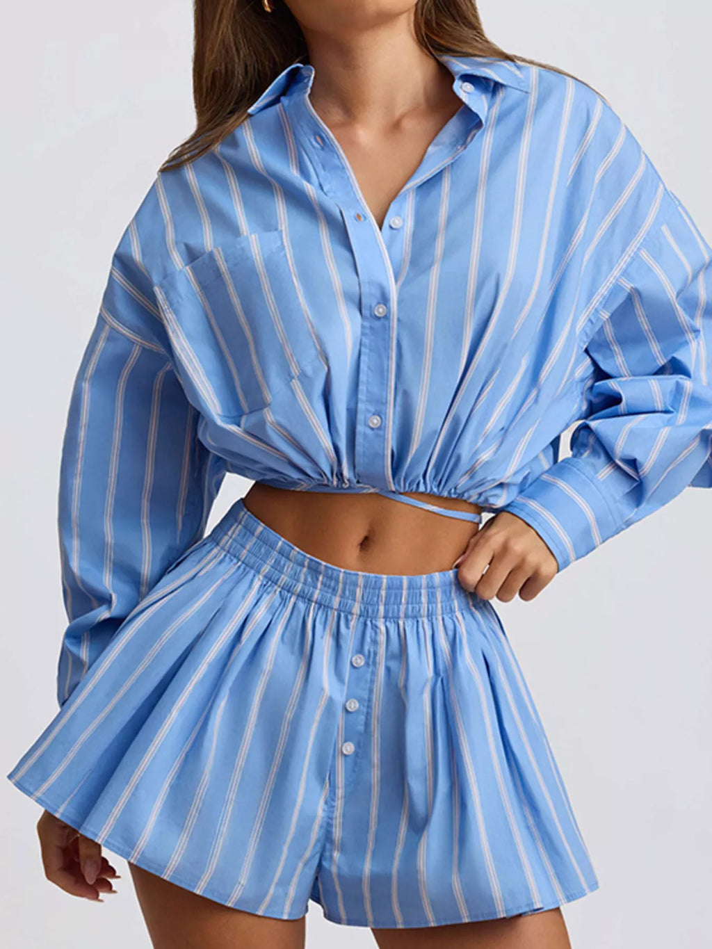 Striped button-up shirt and shorts set by Shopimist, featuring a casual, stylish design in soft, breathable fabric.