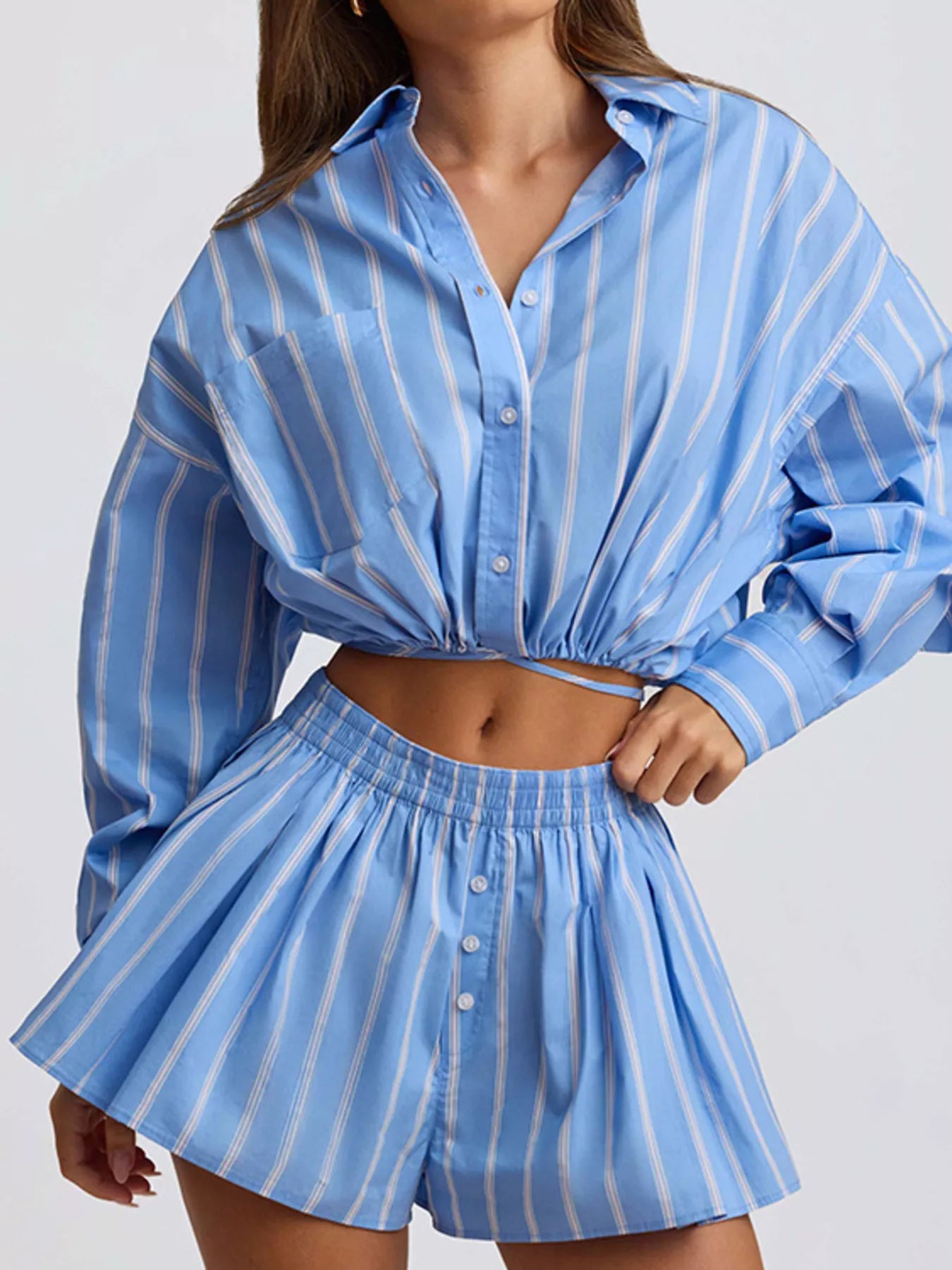 Striped button-up shirt and shorts set by Shopimist, featuring a casual, stylish design in soft, breathable fabric.