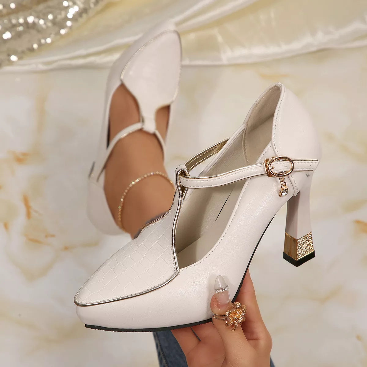 Point toe flare heel pumps by Trendsi featuring sleek design and stylish silhouette, perfect for elegant occasions.