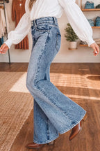 Acid wash flare jeans with pocket detail from Shopimist, showcasing a high-waisted fit and vintage-inspired denim style.