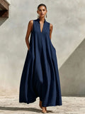 Linen blend sleeveless maxi dress with stand collar in multiple colors, featuring a relaxed fit and side slit from FitiqueFit.