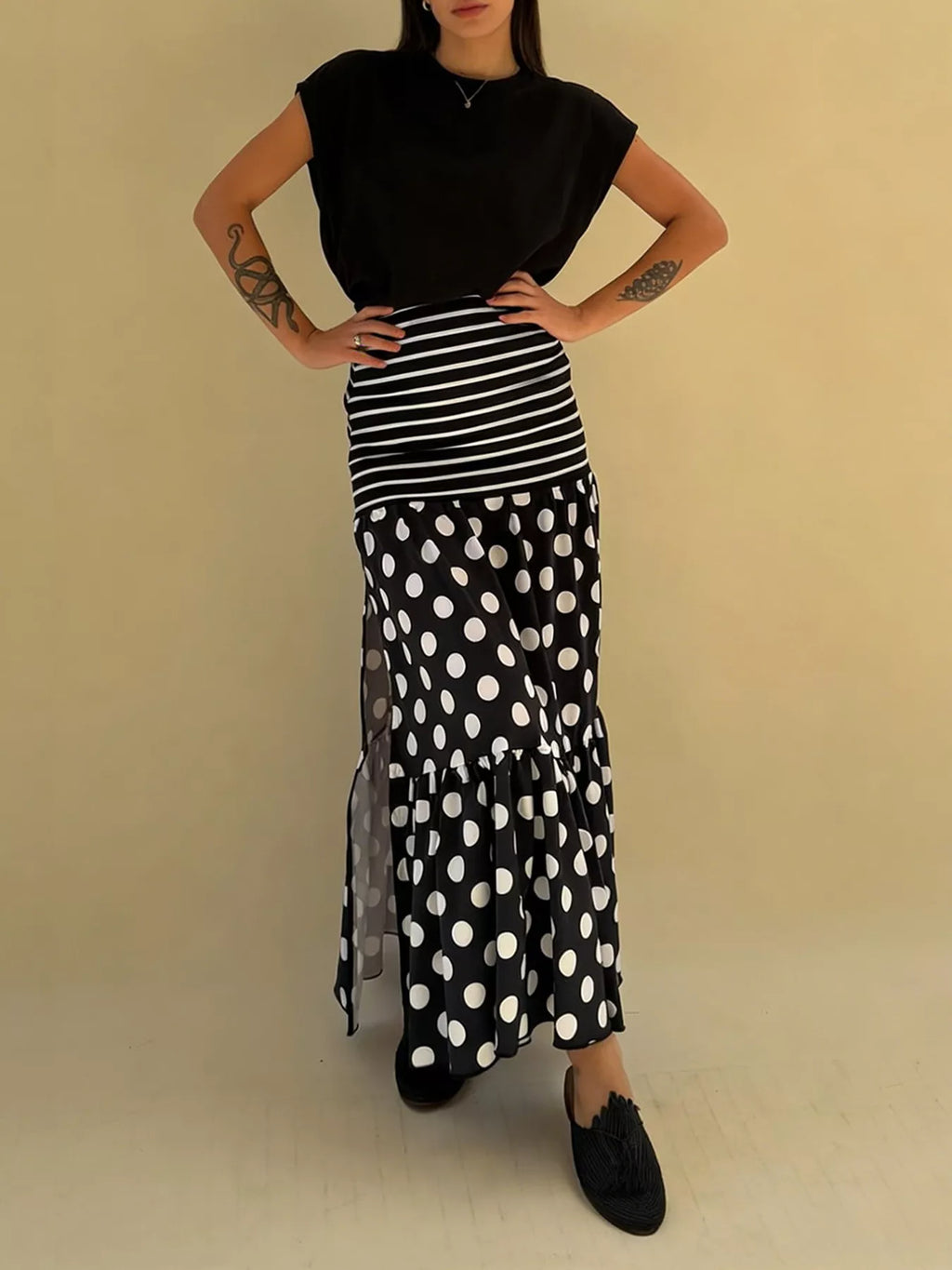 Flowy women's polka dot and striped maxi skirt with a slit, casual bohemian style, by Trendsi.