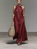Plush Fashion Hub halter neck ruffled sleeveless casual dress with loose fit, flowy fabric, and visible side pockets.