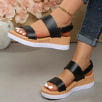 Open toe wedge sandals by Shopimist featuring a stylish design with a comfortable platform and ankle strap for summer wear.