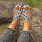 Shopimist toe loop flats sandals featuring a minimalist design with a sleek strap and comfortable sole, ideal for casual wear.