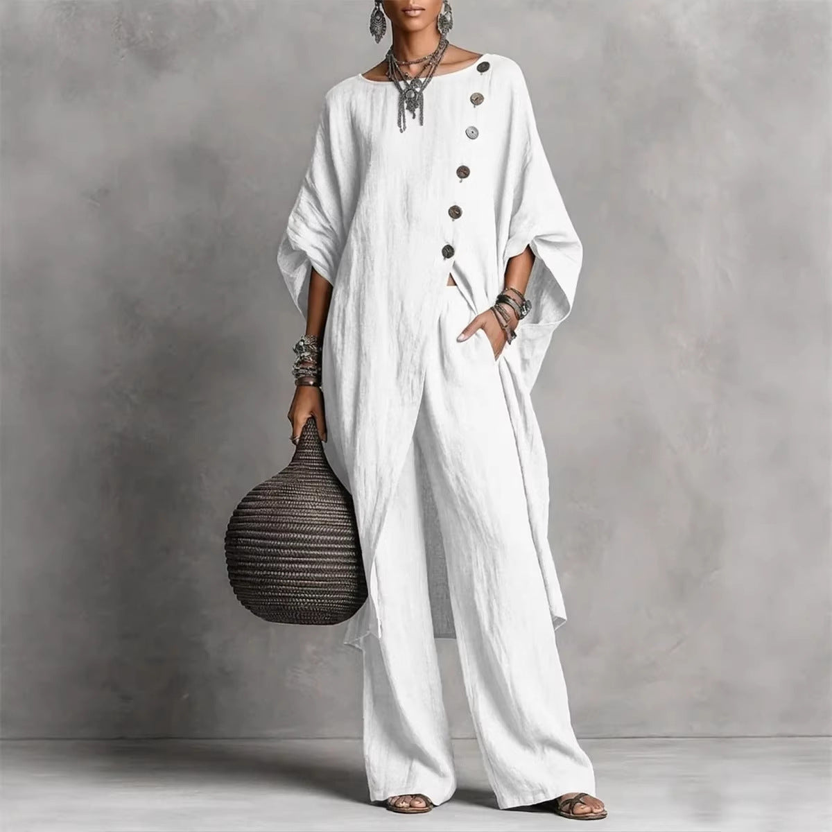 Women's casual drop shoulder three-quarter sleeve irregular shirt and matching pants set by Plush Fashion Hub, stylish and comfortable.