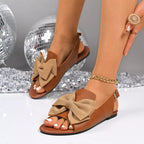 Shopimist bow open toe sandals with stylish straps and a comfortable flat sole, ideal for casual summer wear.