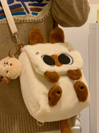 Soft woolen plush cat mini backpack by Trendsi featuring a whimsical feline design and cute, soft aesthetic for casual wear.