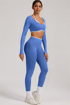 Fitglutes Activewear long sleeve crop top and leggings 2-piece set, stylish gymwear for workouts, in black with sporty design.