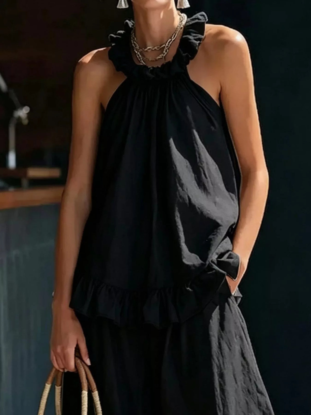 Plus size ruffled halter neck top and wide-leg pants set by Plush Fashion Hub, featuring a stylish matching ensemble.