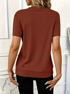 Women's ribbed half zip short sleeve casual top by Trendsi, soft stretch pullover with a fitted ribbed design and short sleeves.