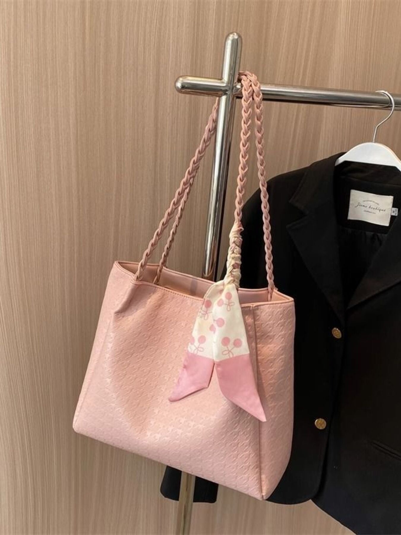 Braided handle tote bag by Plush Fashion Hub featuring a stylish woven design and spacious interior for everyday use.
