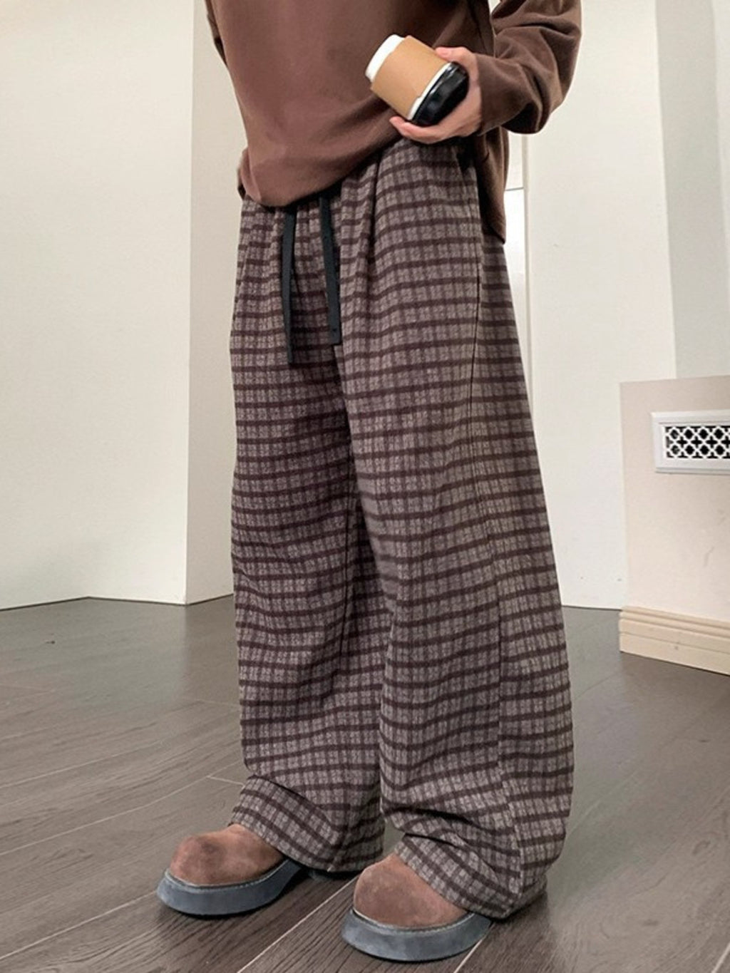 Men's plaid wide leg casual pants with drawstring waist by Trendsi, featuring a relaxed fit and stylish plaid pattern.