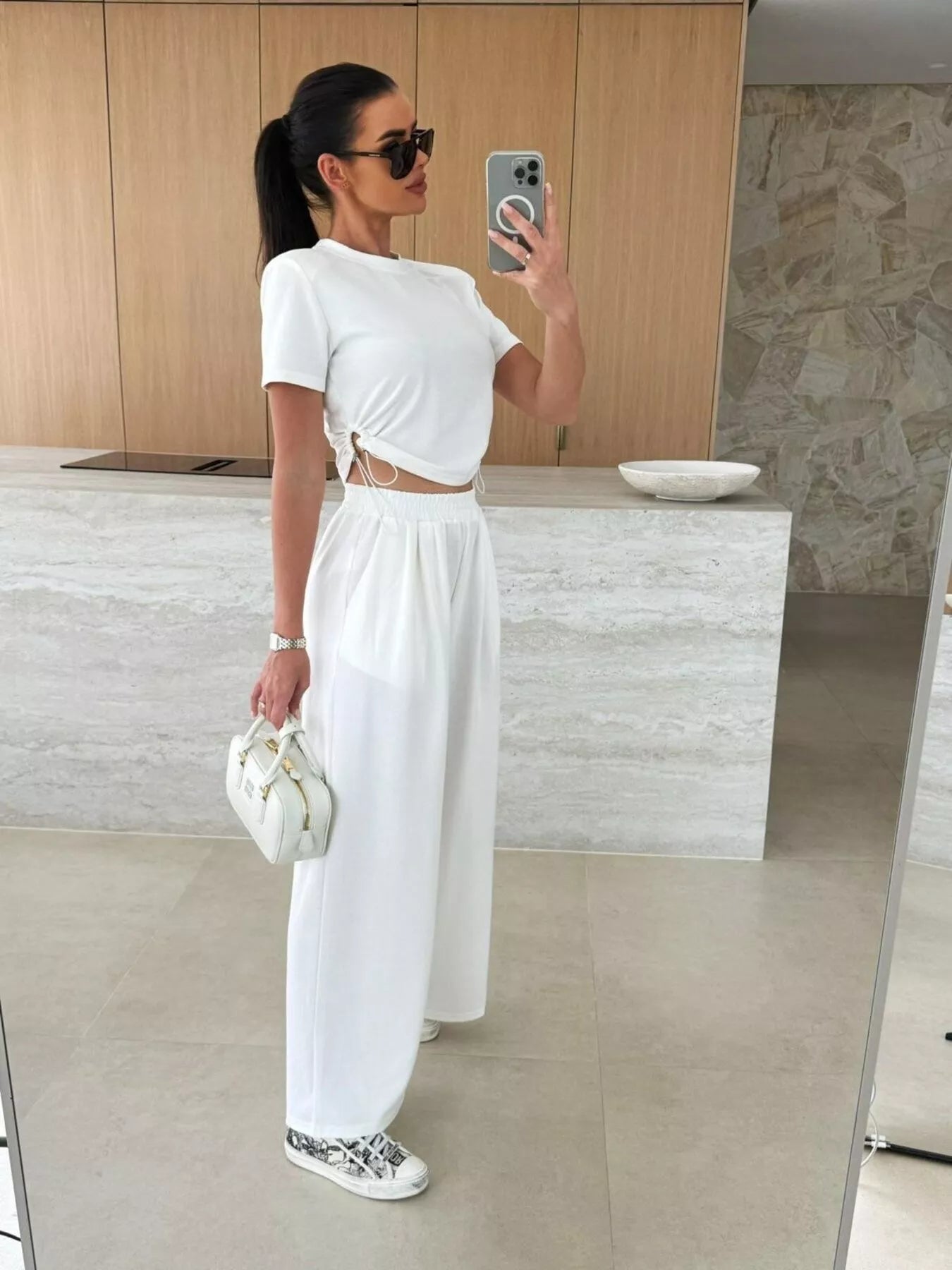 Drawstring crop top and wide-leg pants set by Plush Fashion Hub, featuring a stylish two-piece outfit with a comfortable fit.