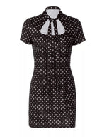 Polka dot cut-out front mini dress by Shopimist featuring a stylish design and playful pattern, shown on a model.