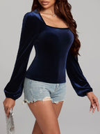 Square neck long sleeve velvet top from Trendsi featuring a fitted design and soft, luxurious fabric in a stylish silhouette.