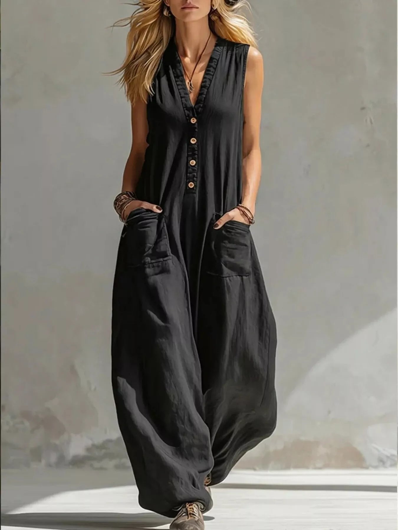 Plus size plush fashion hub V-neck sleeveless wide-leg jumpsuit displayed on a model with a relaxed fit and stylish design.