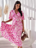 Printed flutter sleeve midi dress by Shopimist featuring a flowy design and vibrant pattern, perfect for casual or semi-formal occasions.