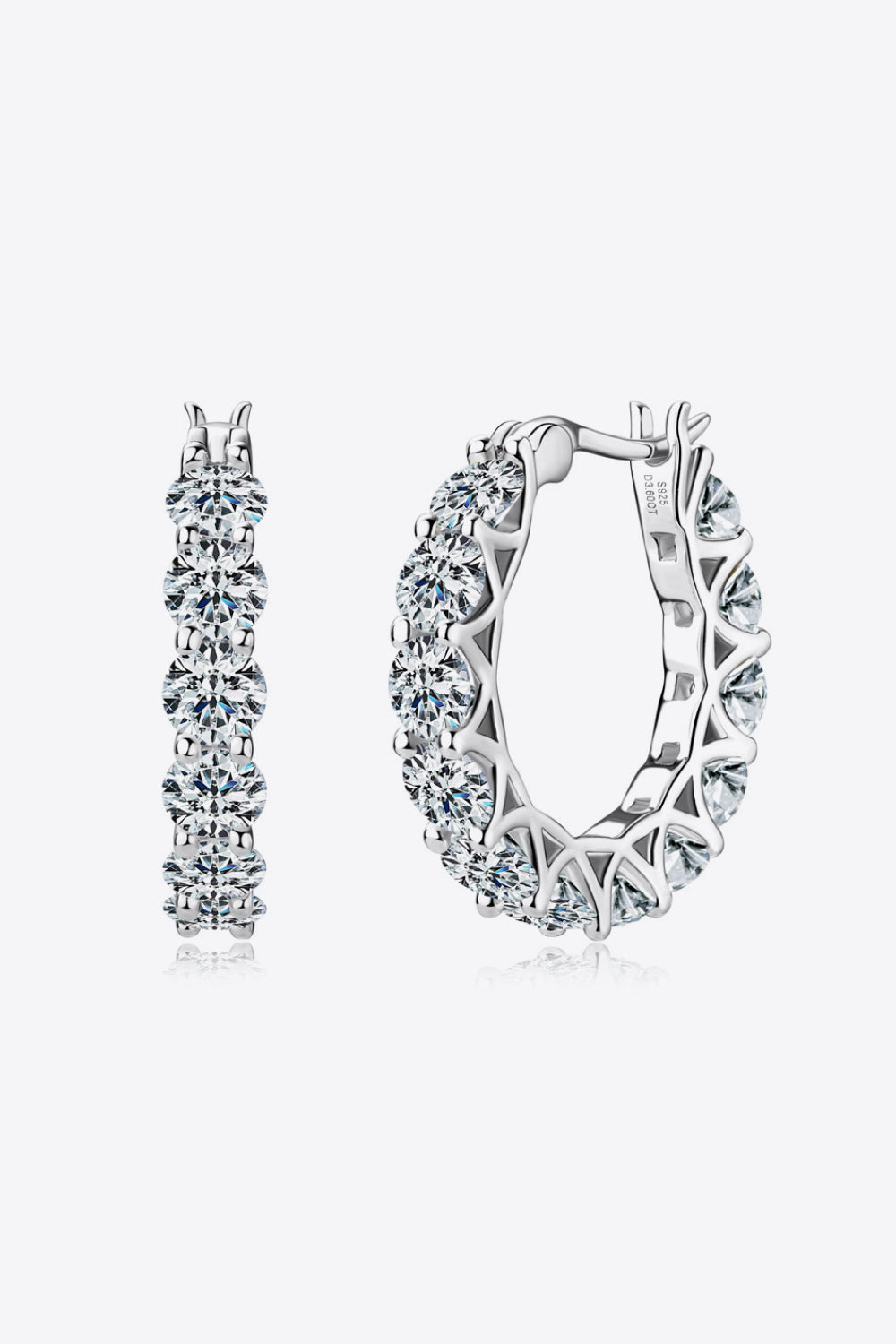 Sterling silver moissanite earrings with 7.2 carat stones, elegant jewelry piece showcasing sparkling gemstone details.