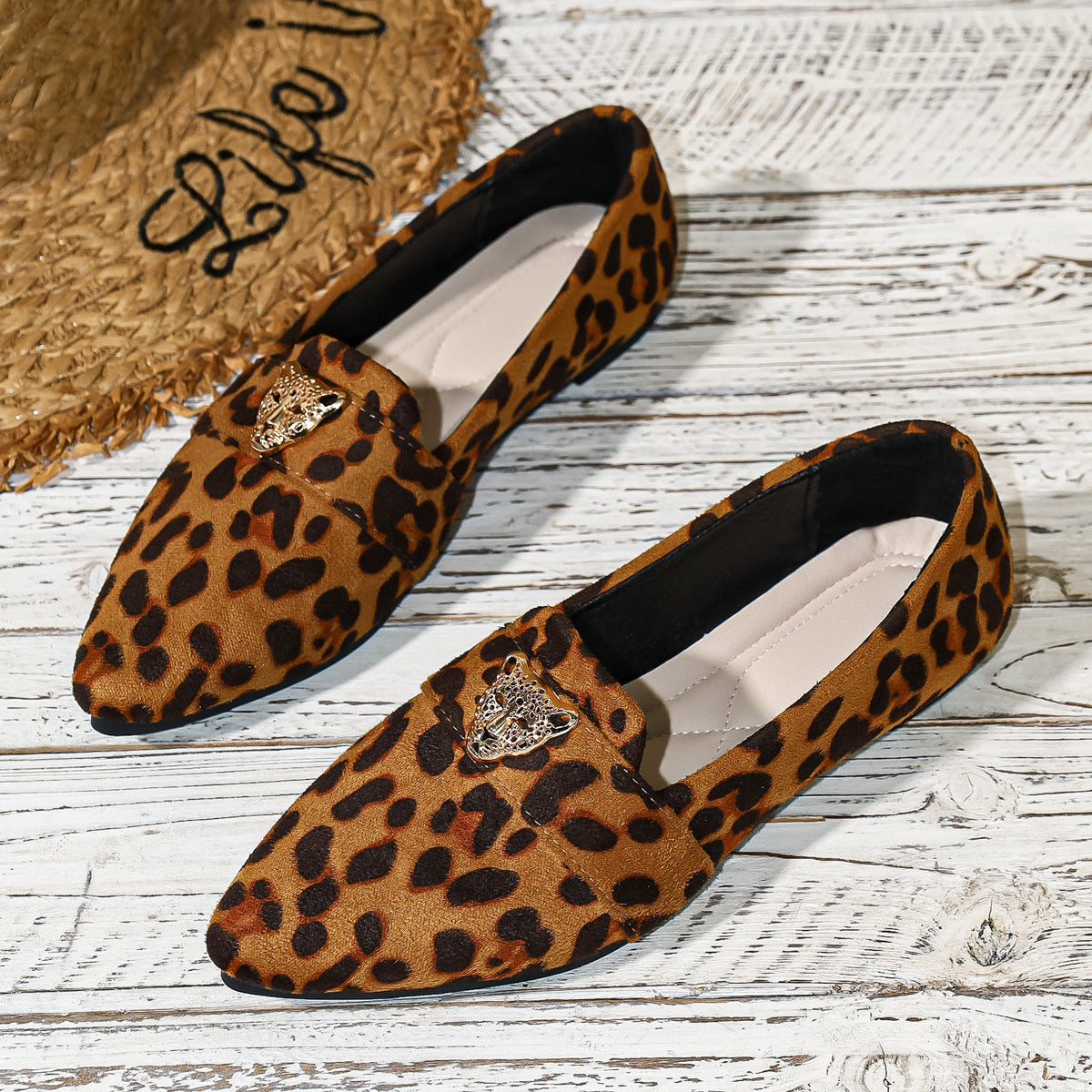 Point toe slip-on footwear by Trendsi featuring a sleek design and classic silhouette, perfect for stylish, comfortable everyday wear.
