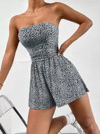 Chic strapless romper with ruched waist by Trendsi, featuring a stylish, fitted design perfect for summer or casual occasions.