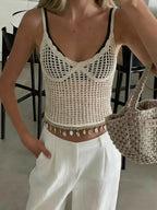 Crochet knit shell hem cami tank top from Trendsi featuring a lightweight design and shell detail at the hem.
