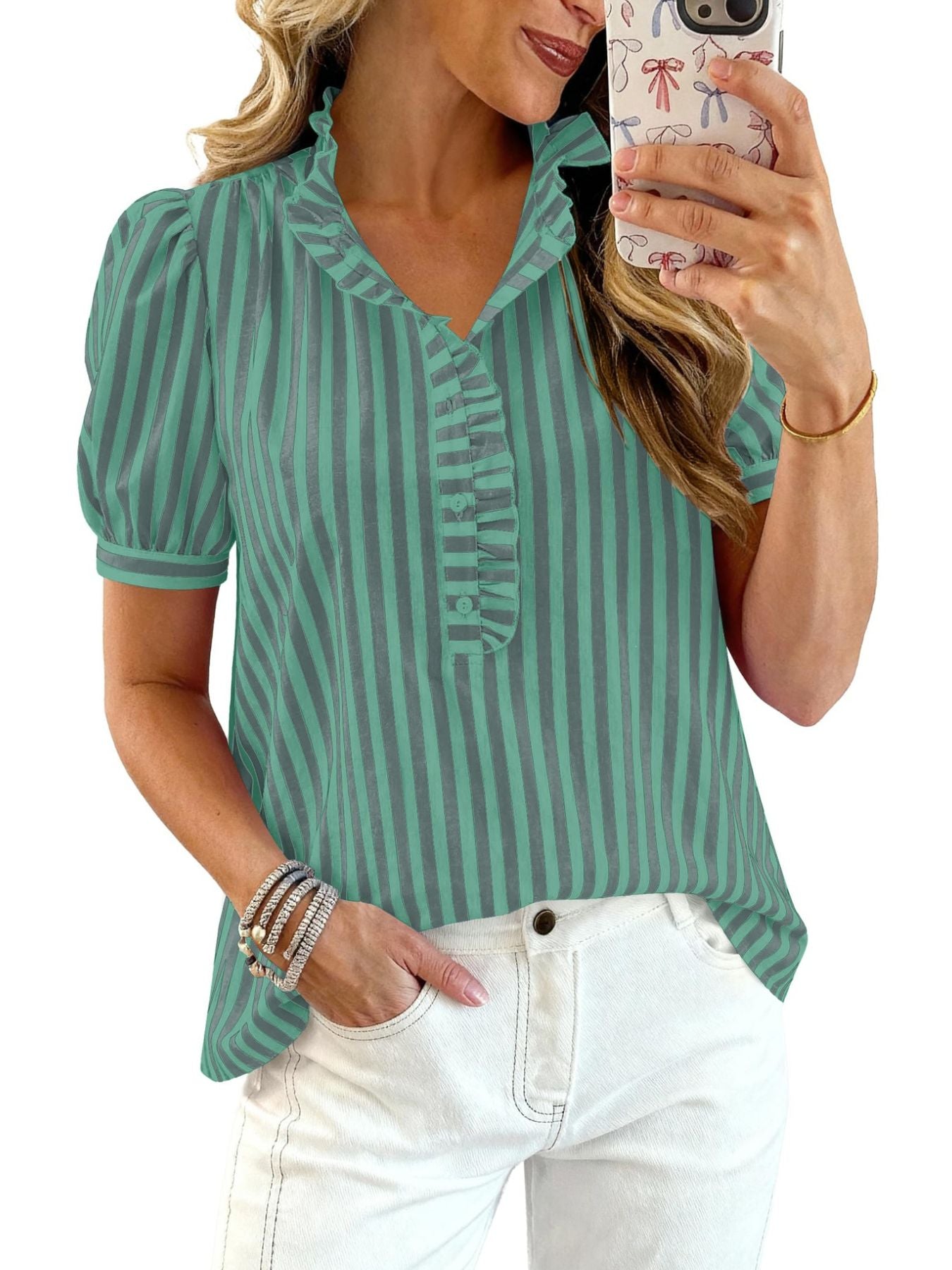 Women's striped puff sleeve blouse with ruffled details, featuring a stylish and feminine design by Trendsi.