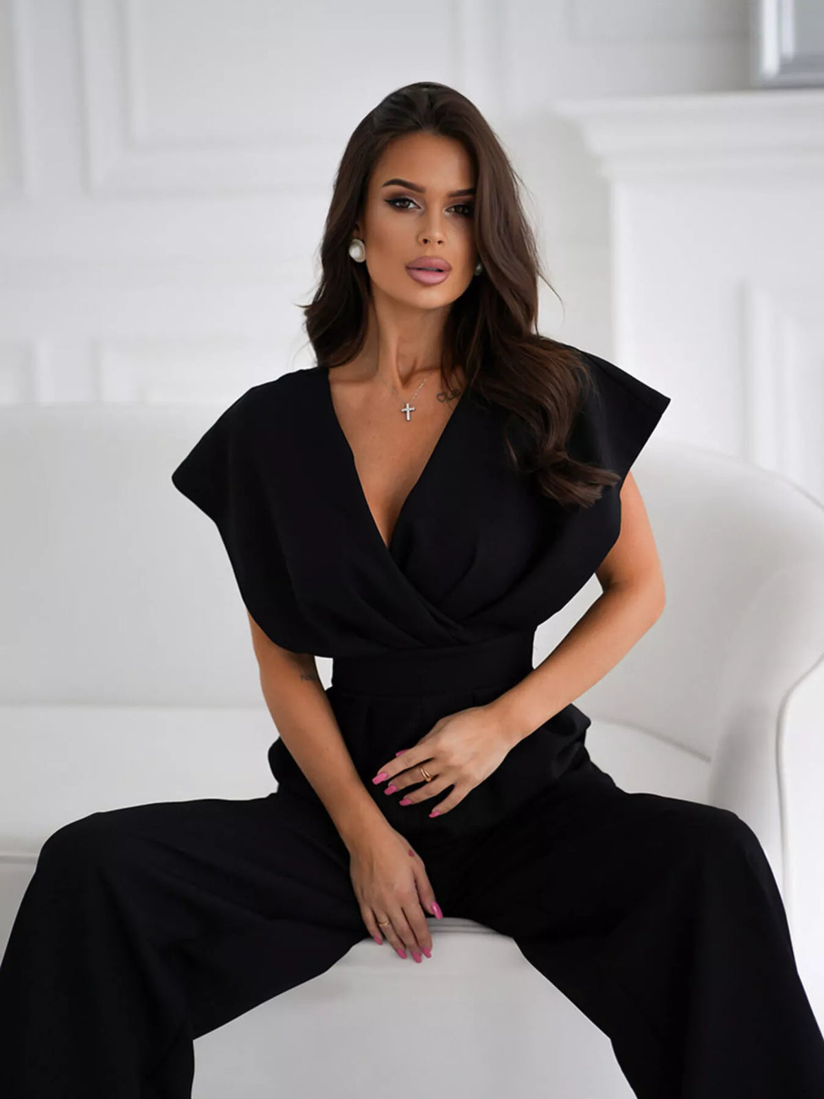 Plush Fashion Hub plush surplice wide-leg jumpsuit with flowing fabric and deep V neckline, stylish and comfortable for casual wear.
