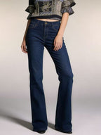 High-waisted bootcut denim jeans by Plush Fashion Shop, showing the fit and style on a model.