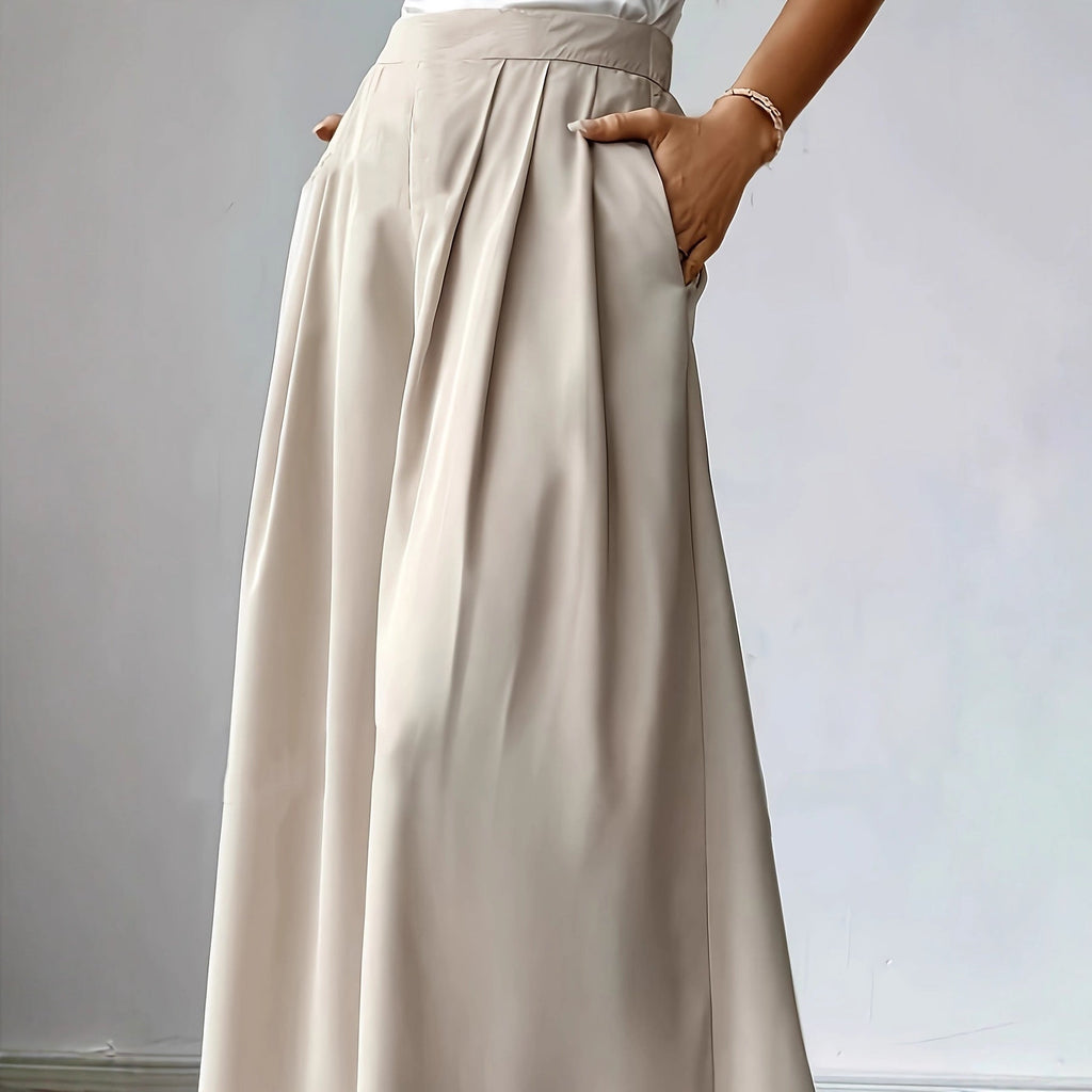 Women's high-waist pleated wide-leg linen pants by FitiqueFit, relaxed bohemian casualwear with a loose fit and flowing design.