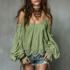 Women's ruffle detail puff sleeve blouse with strap-layered lace look from Plush Fashion Hub, showcasing the elegant design.