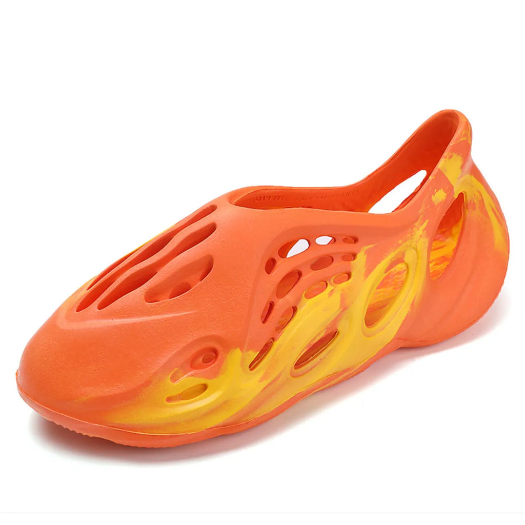 Hollow-out flat sandals from Trendsi, stylish open-toe footwear with cut-out design and comfortable flat sole.