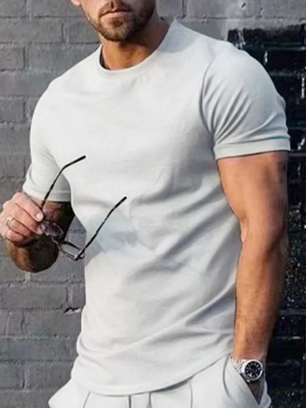 Plus size men's casual T-shirt from Trendsi in solid color, front view showing round neckline and relaxed fit.