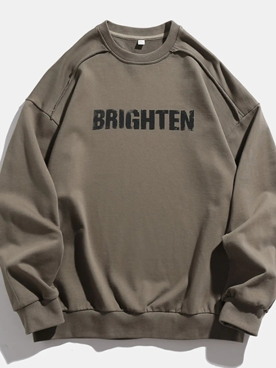 Men's long sleeve sweatshirt with letter graphic on round neck, made by Trendsi, in a casual, comfortable style.