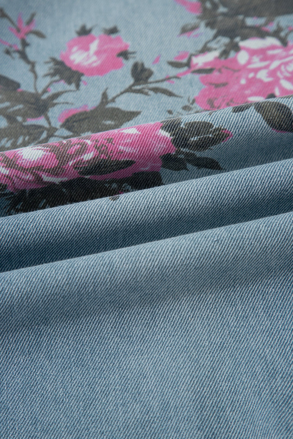 Esme Floral Print Bootcut Jeans by Threaded Pear featuring a floral pattern and classic bootcut fit on a model.