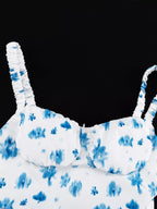 Floral print ruffle hem tank top by Shopimist featuring a lightweight design and feminine ruffle details.