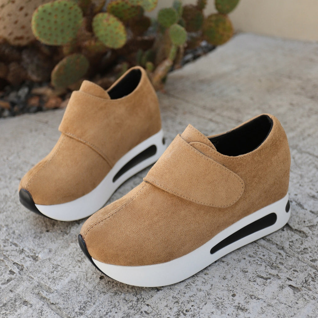 Women's round toe platform sneakers by Trendsi featuring a trendy mid-heel design and casual style, shown in a stylish shoe image.